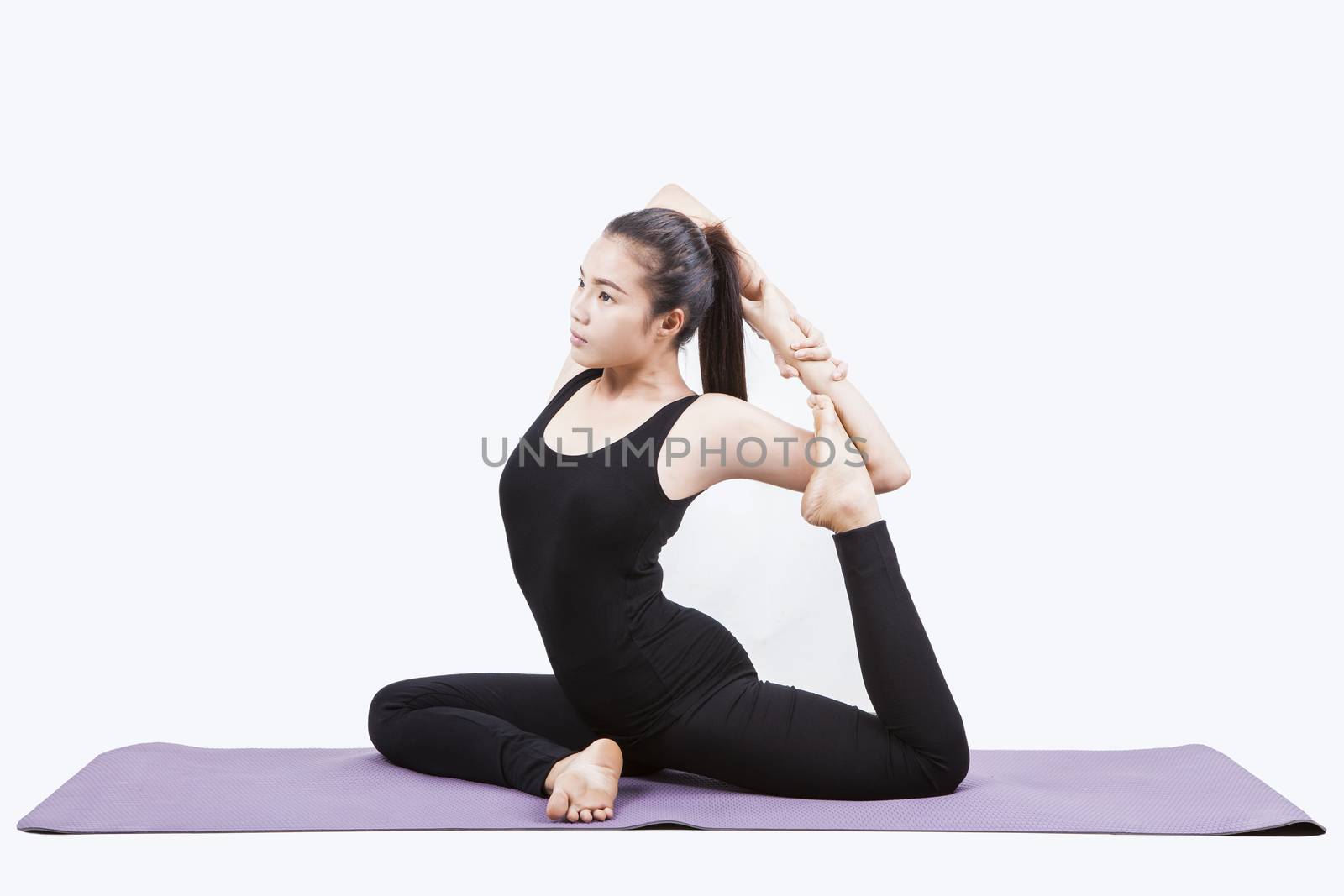 portrait of young asian woman exercise playing yoga isolated white