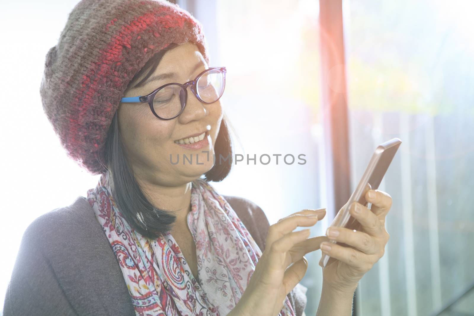 woman chat social media by smart phone use for people connecting by khunaspix