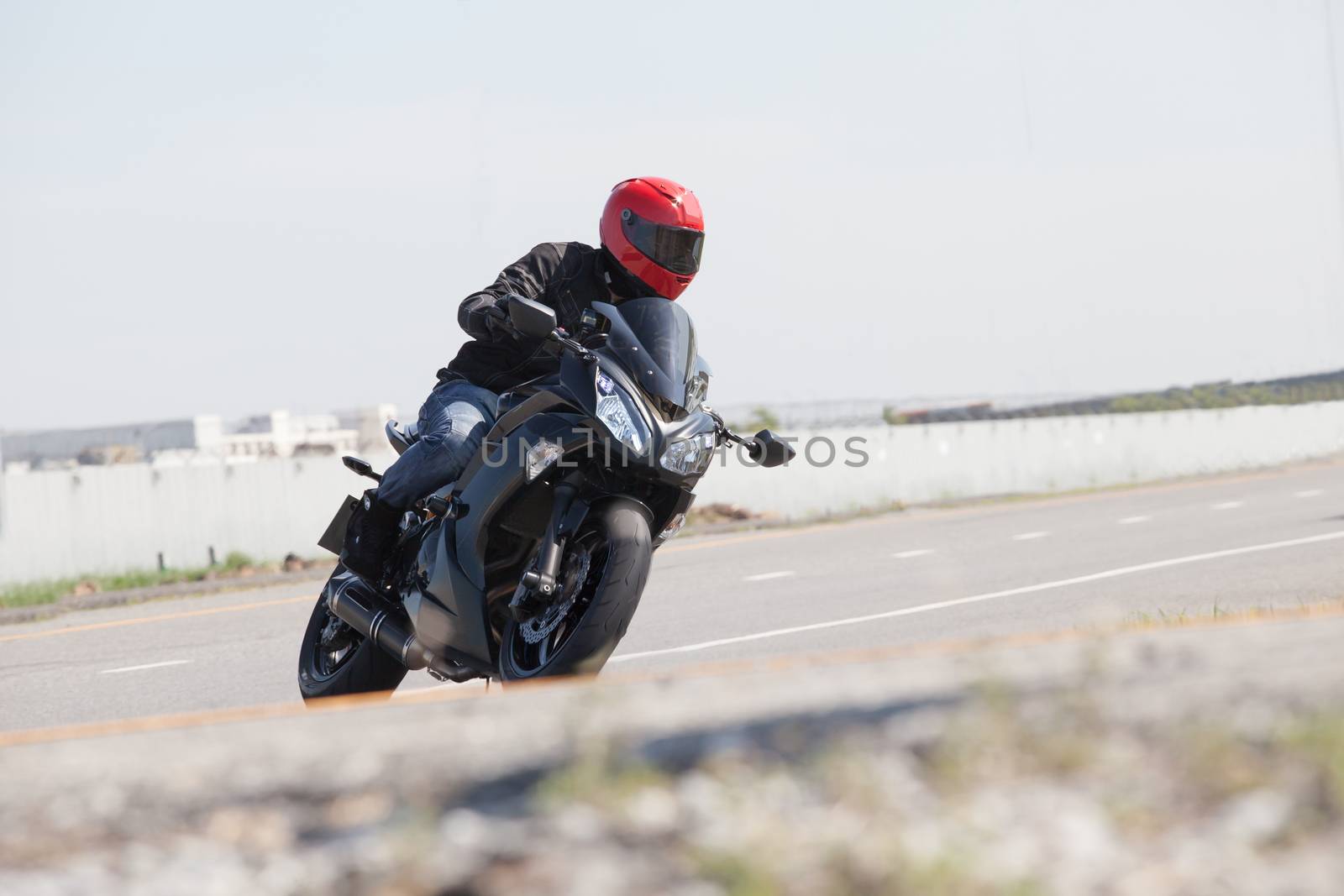 man riding motorcycle by khunaspix
