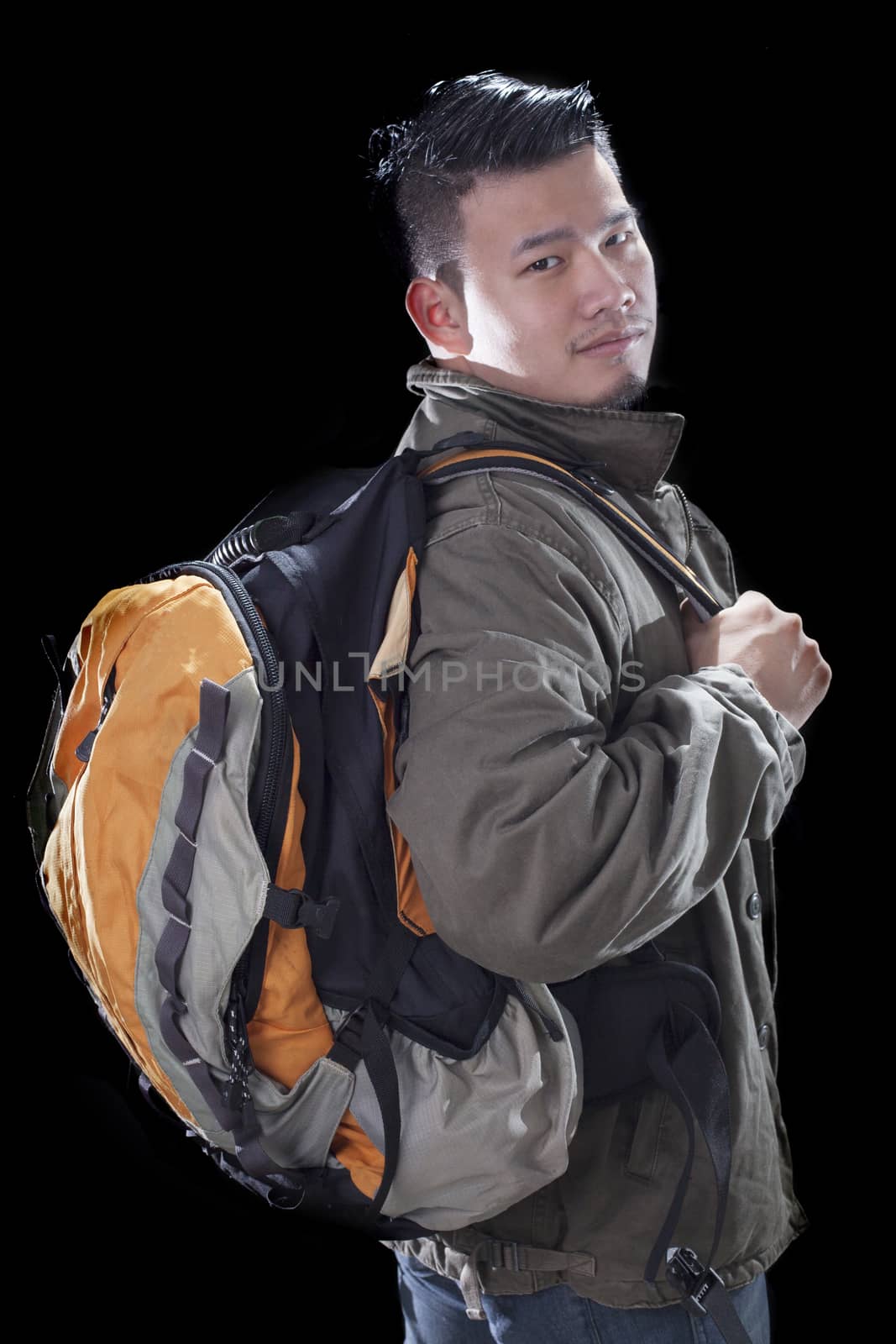young asian man carrying back pack use for people traveling and  by khunaspix