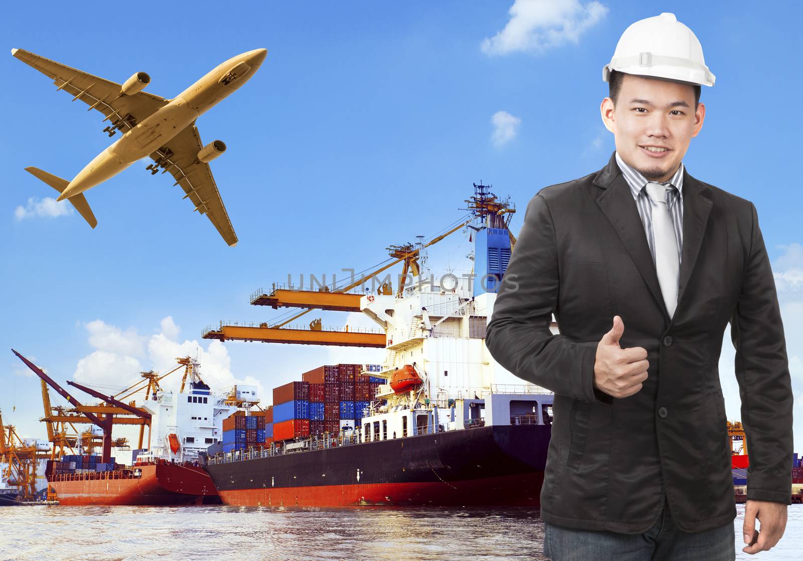 working man and commercial ship on port and air cargo plane flyi by khunaspix