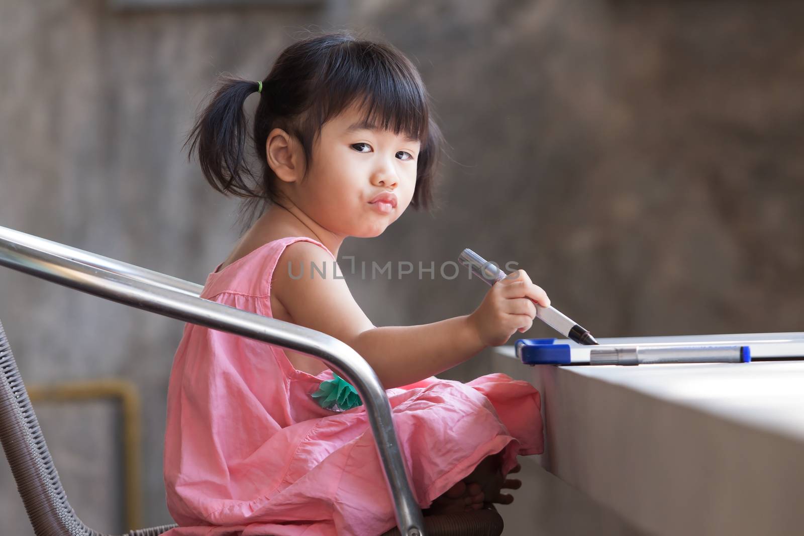 lovely kid practice for writing on white broad before class lear by khunaspix