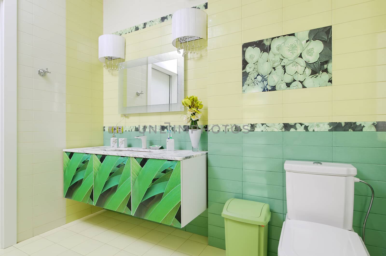 Bathroom design with beautiful grass print on bath cabinet and w by RawGroup