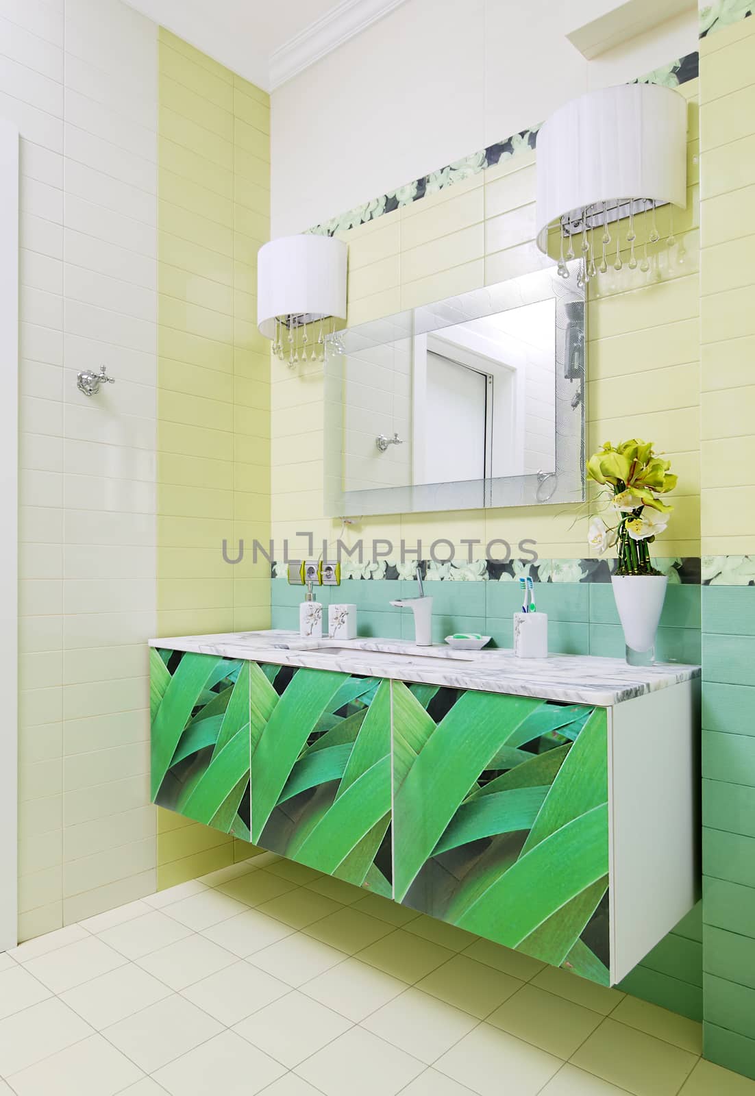 Bathroom design with beautiful grass print on bath cabinet