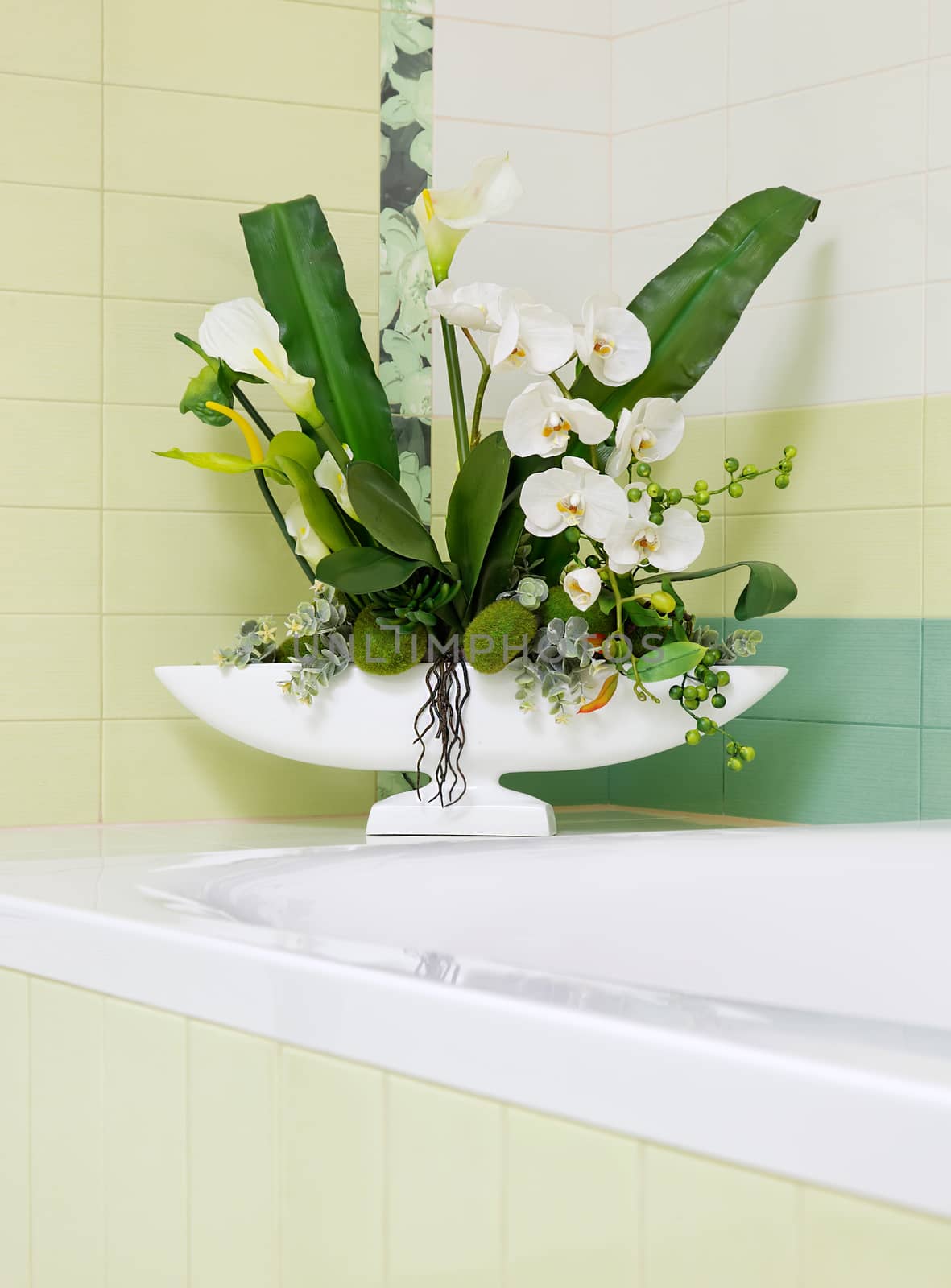 Beautiful white orchid flower decor in bathroom design