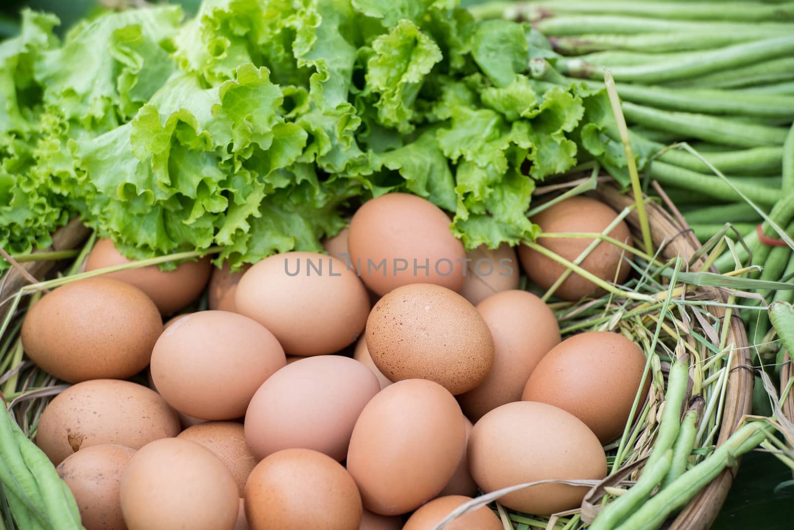 Eggs of chicken in basket at market.