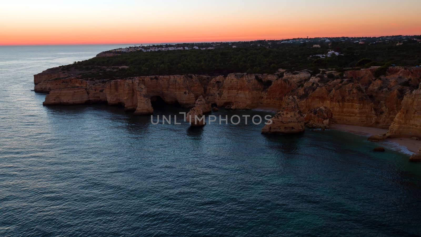 Aerial from famous beach Praia da Marinha in the Algarve Portugal at sunset