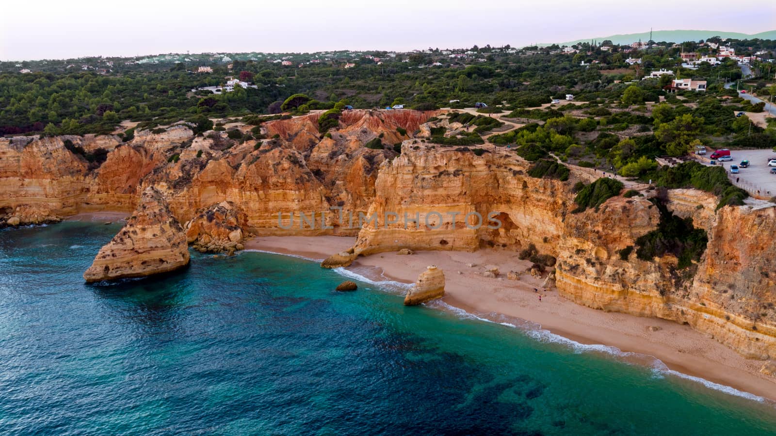 Aerial from famous beach Praia da Marinha in the Algarve Portugal at sunset