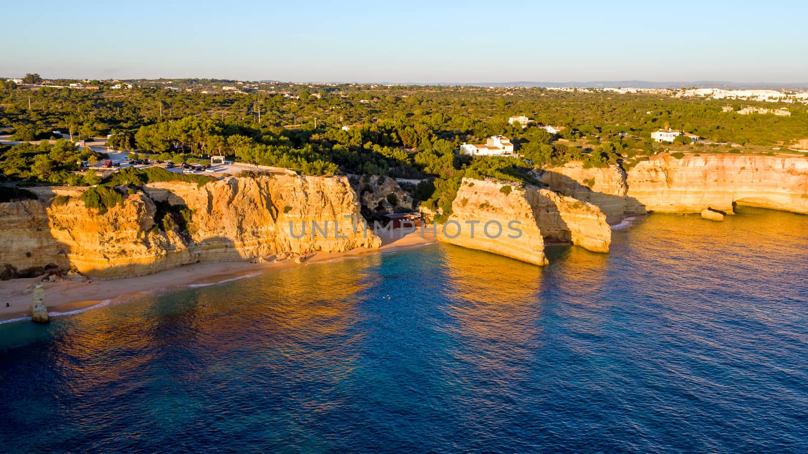 Aerial from famous beach Praia da Marinha in the Algarve Portugal at sunset