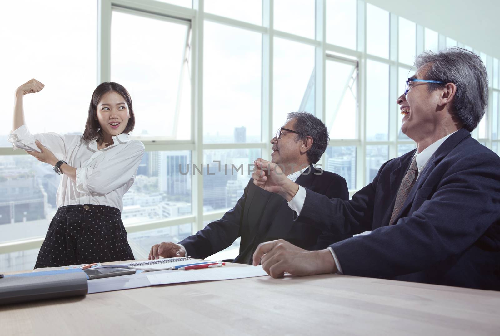 working woman show power in office meeting room in front of senior administrator 