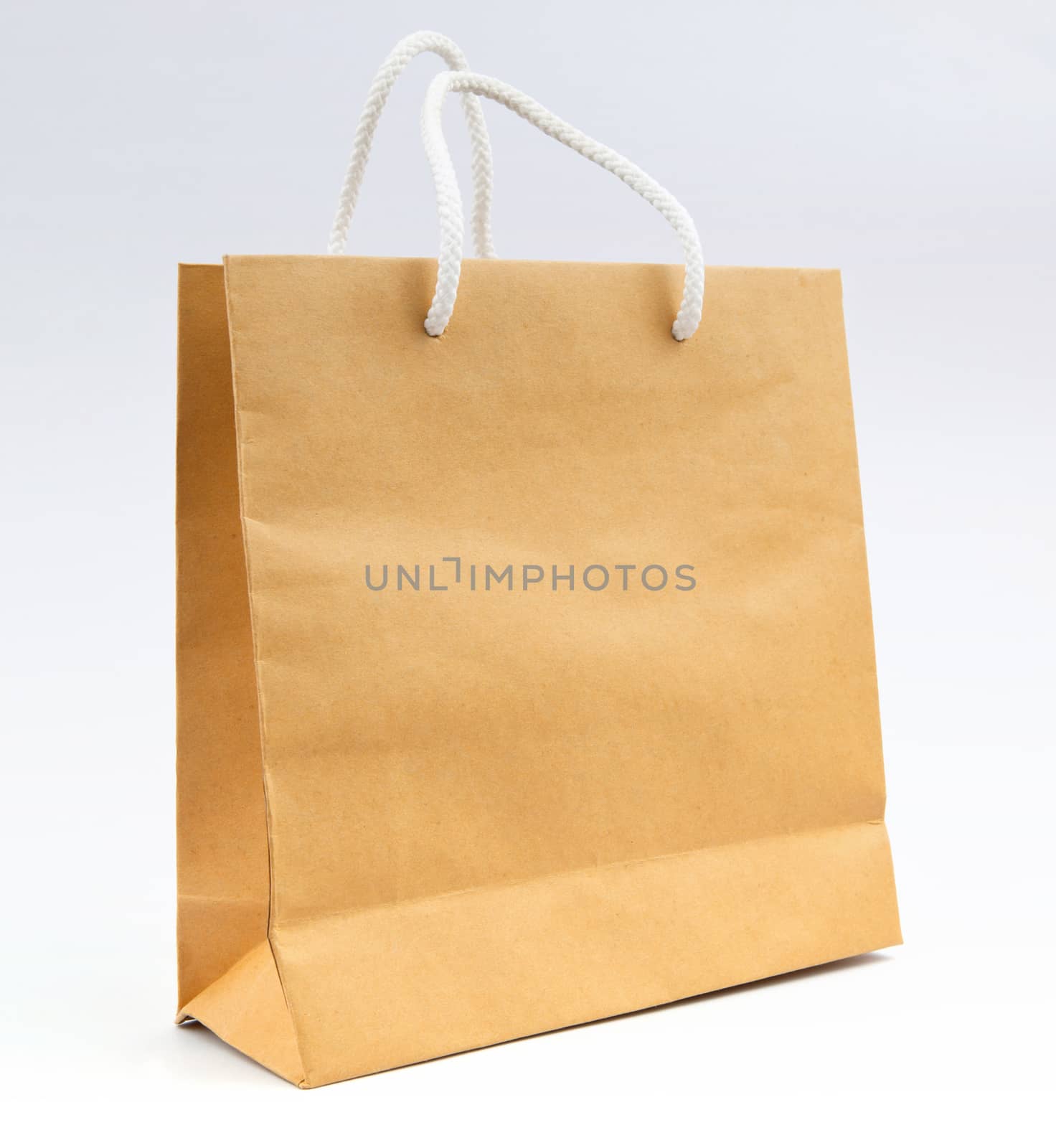 recycle paper bag on white background use for shopping and save  by khunaspix
