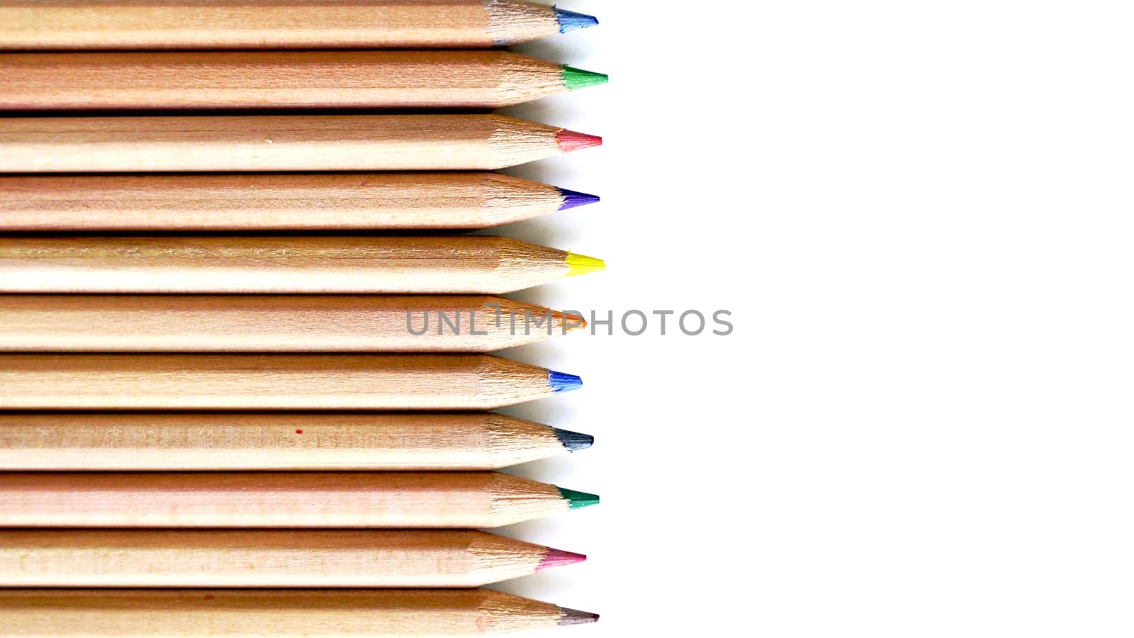 Wooden Color pencils arrangement top view stationery office supply business isolated