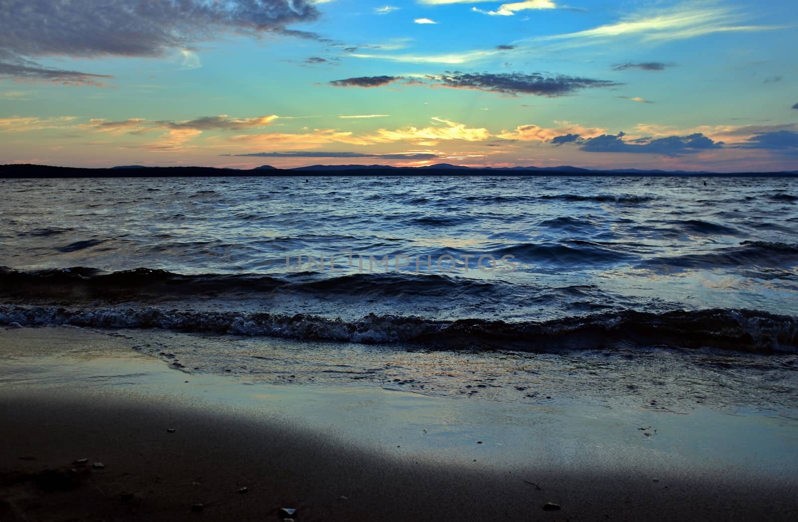 beautiful Lake Uwildy in the southern Urals in the summer evening