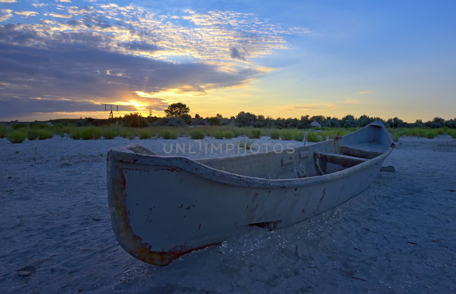 Beautiful sunset with fishing boat