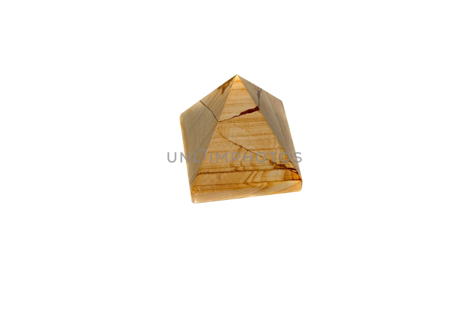 A pyramid of marble onyx isolated on white background. Pyramid made of natural onyx.