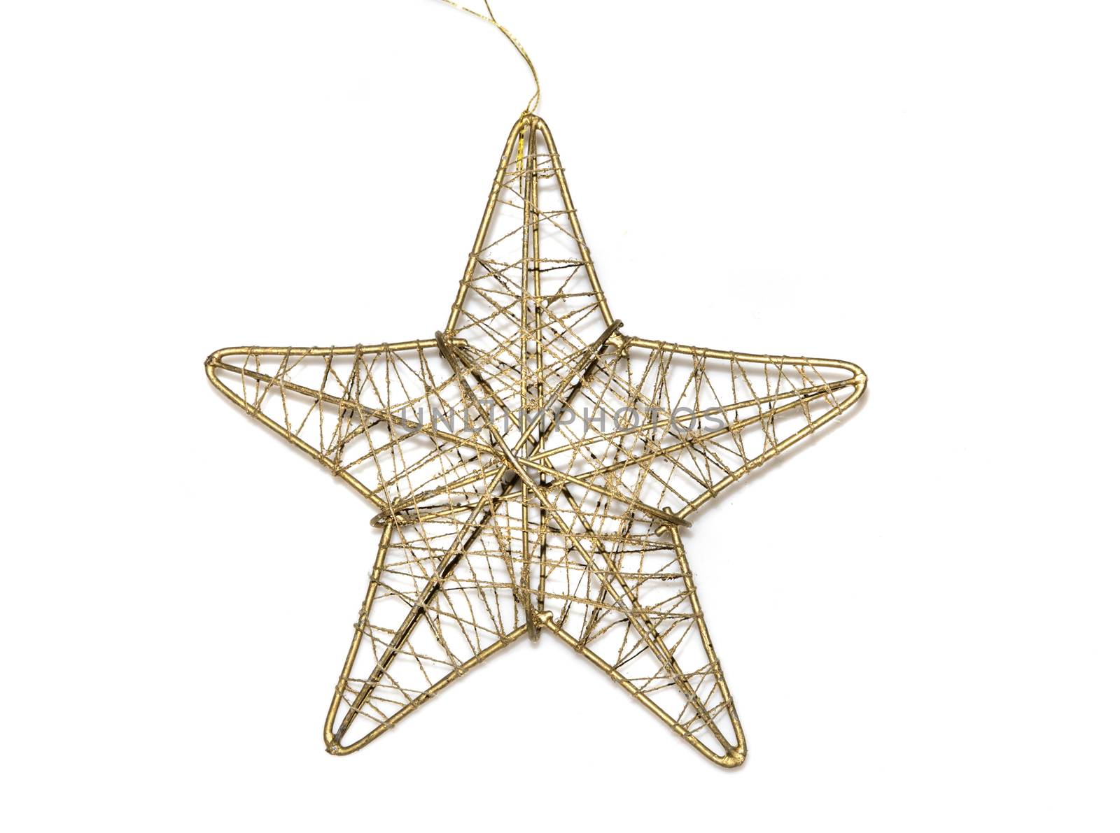 old golden christmas toy star isolated on white background