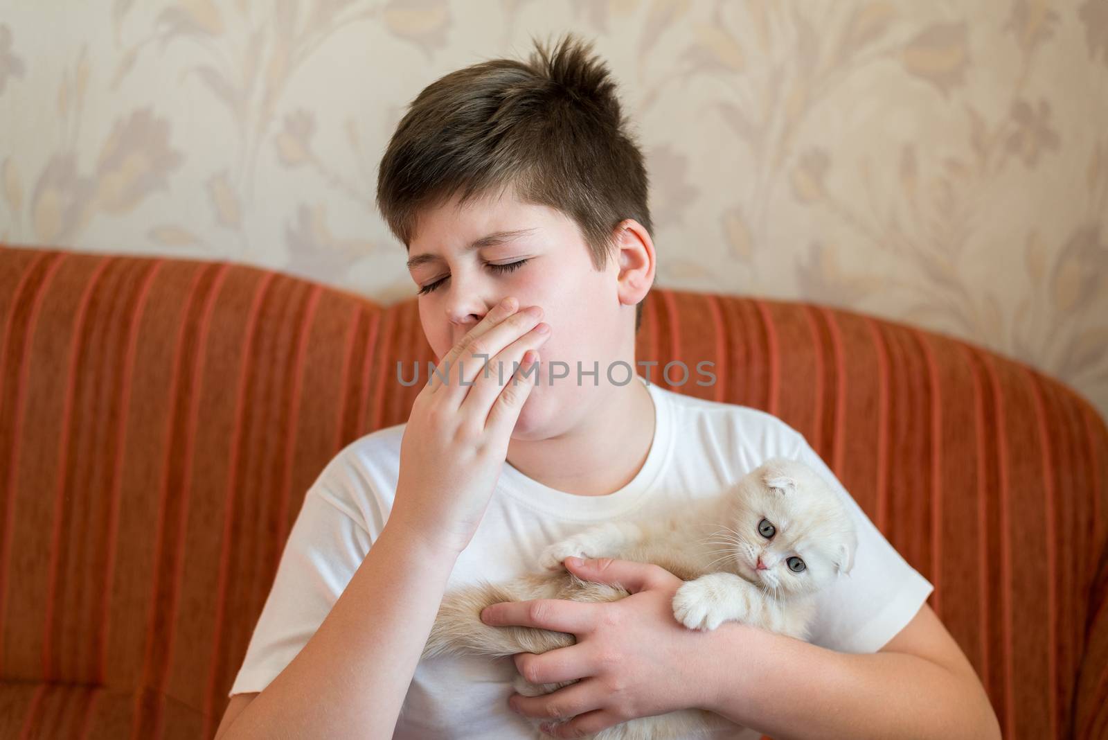 The boy is allergic to cat by olgavolodina