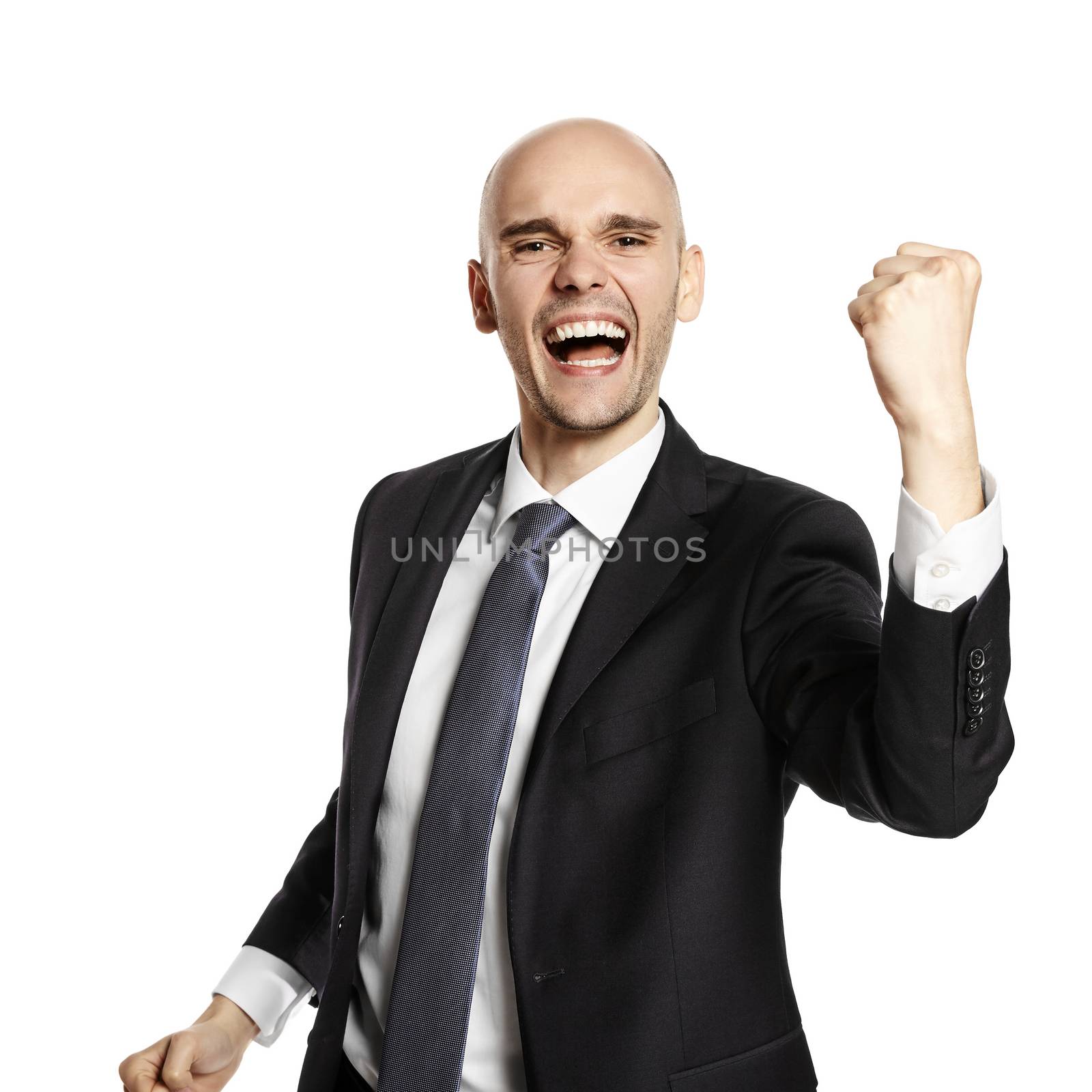 Studio shot of a young man in a gesture of victory. Studio shot isolated on white background.