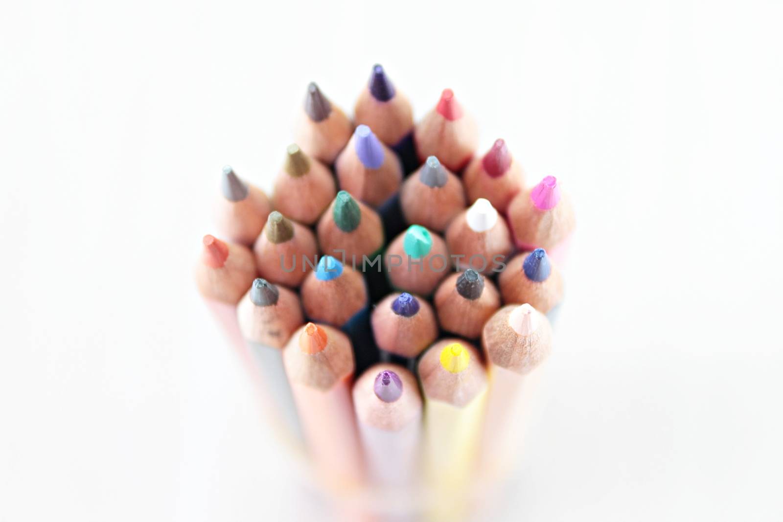 Business or teamwork concept : Group of color pencil on white background selective focus