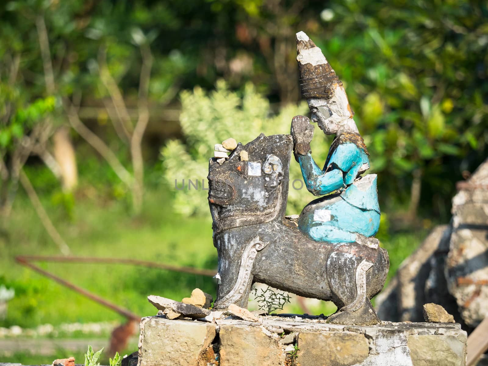 Broken, religious figurine in Mrauk U, Myanmar by epixx