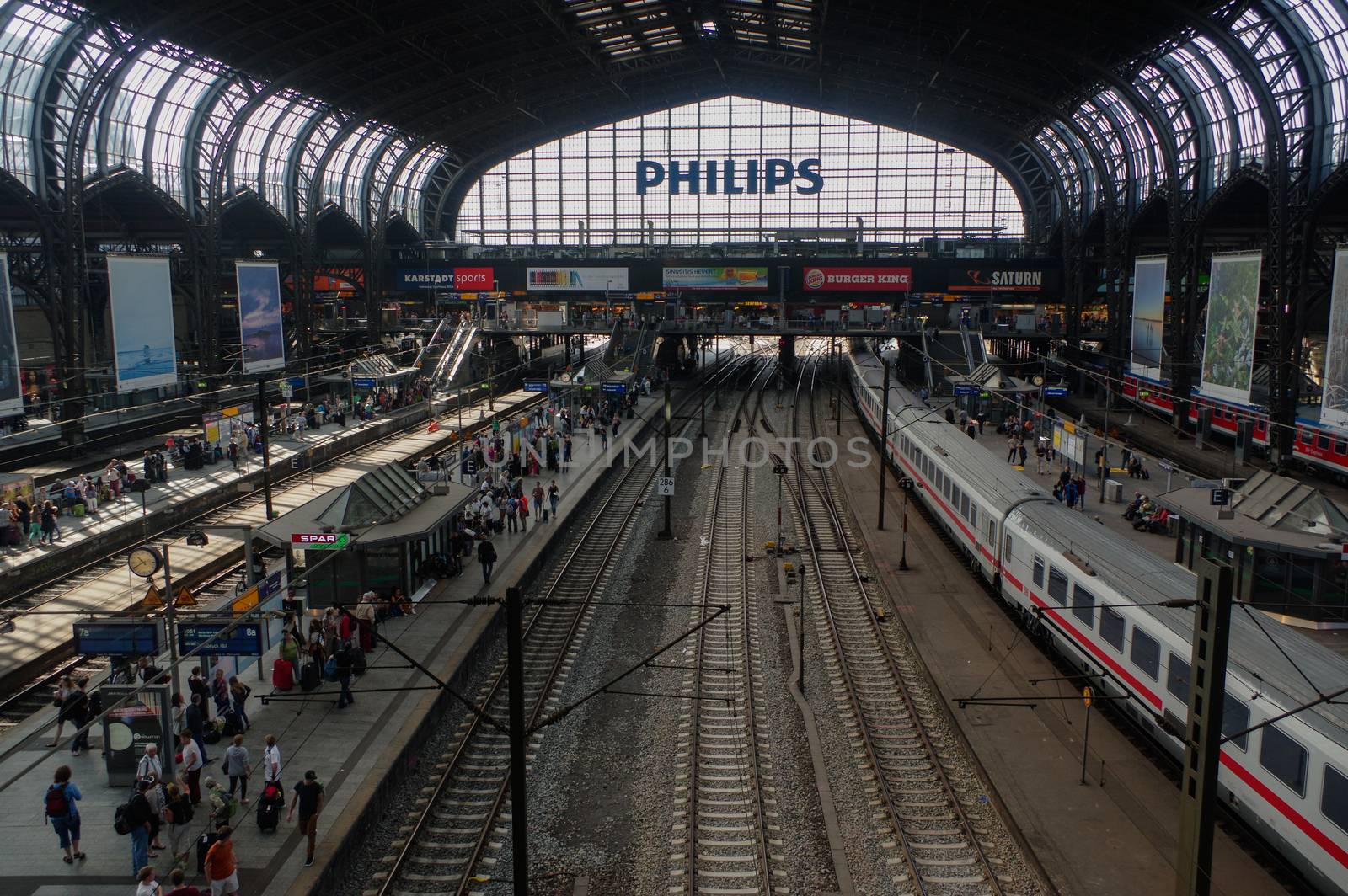 HAMBURG, GERMANY - JULY 18, 2015: Hauptbahnhof is the main railway station in the city, the busiest in the country and the second in Europe. by evolutionnow