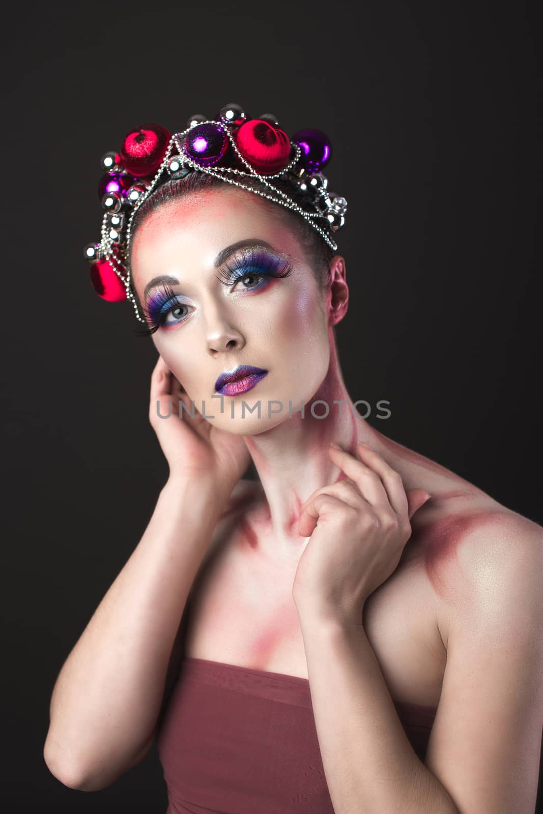 Elegant Model with Bright New Year's Eve Make-up in a Wreath of  by Multipedia