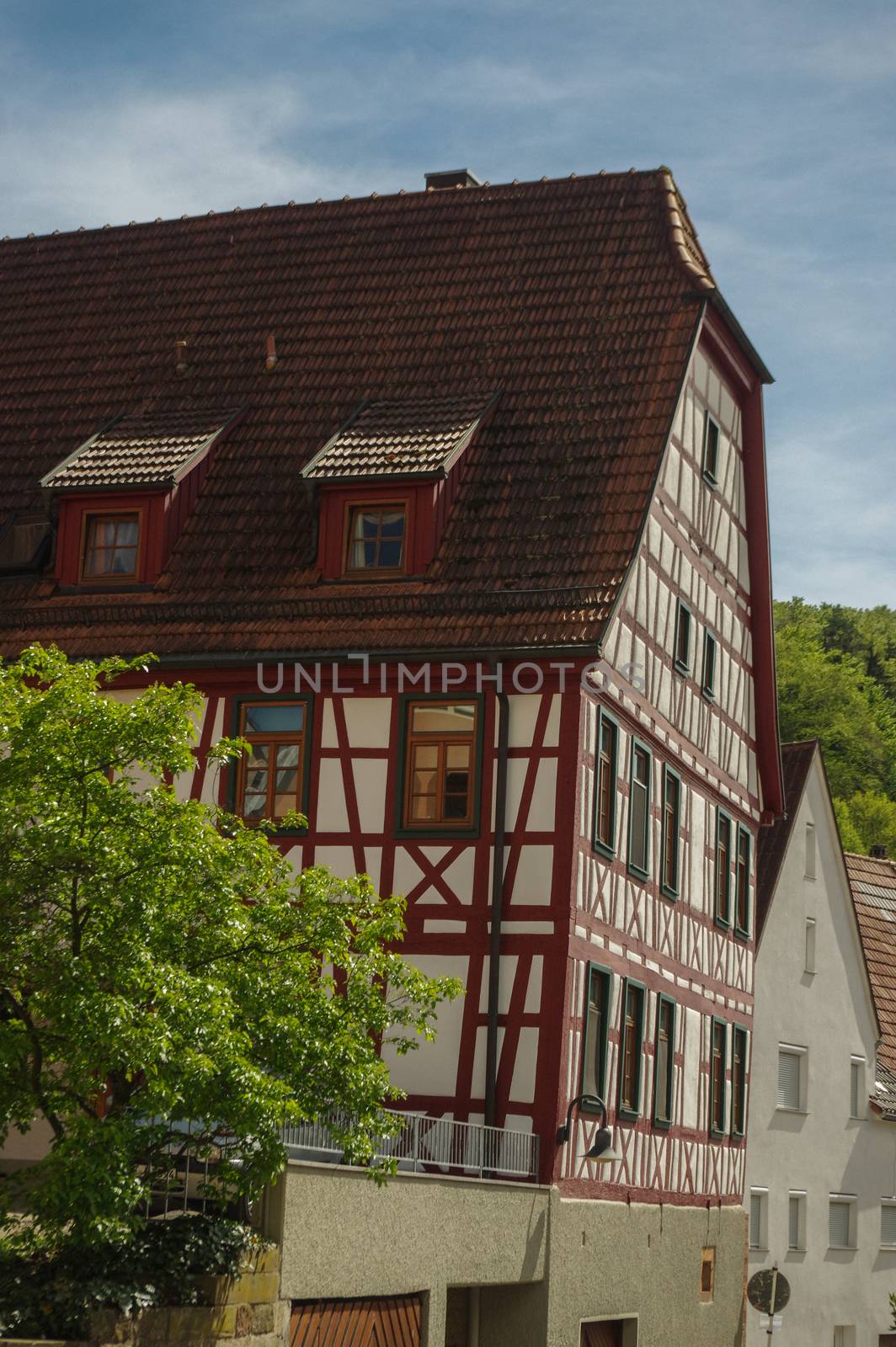 MOENSHEIM, PFORZHEIM, GERMANY - JUNE 10, 2015: Tudor style house. Monsheim is a town in the district of Enz in Baden-Wuerttemberg in southern BRD. by evolutionnow