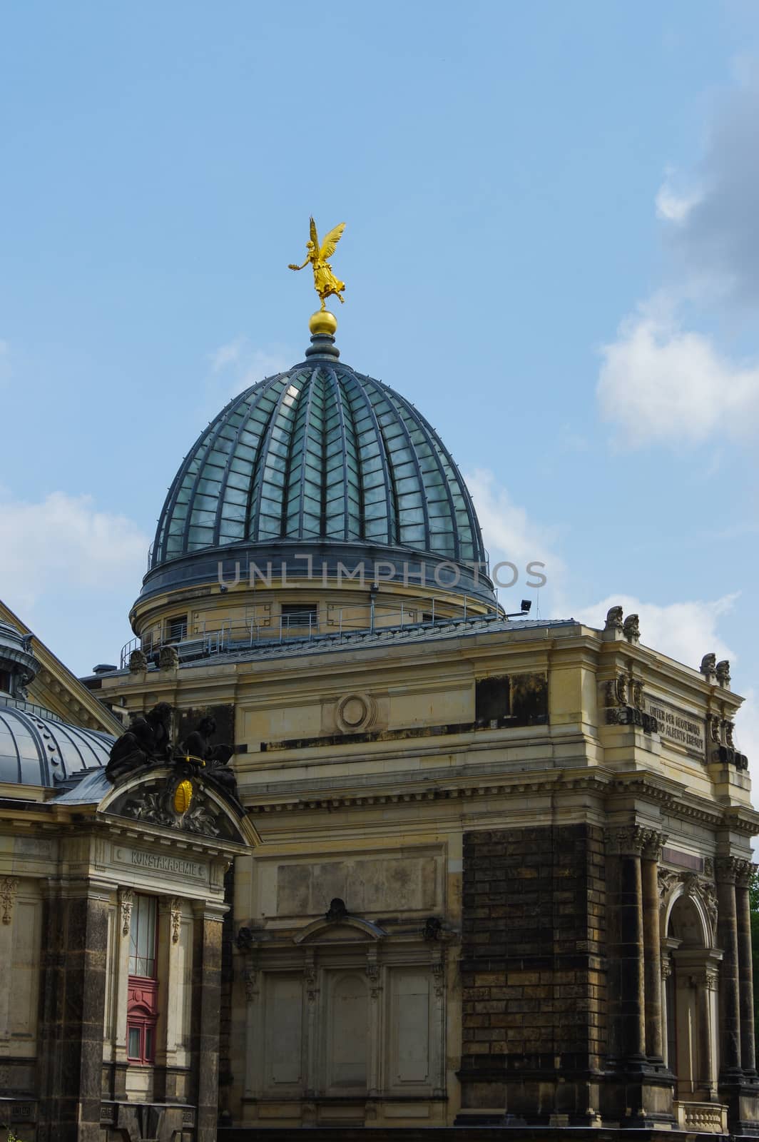 DRESDEN, GERMANY - JULY 13, 2015: the Academy of Fine Arts - glass cupola with gold angel by evolutionnow