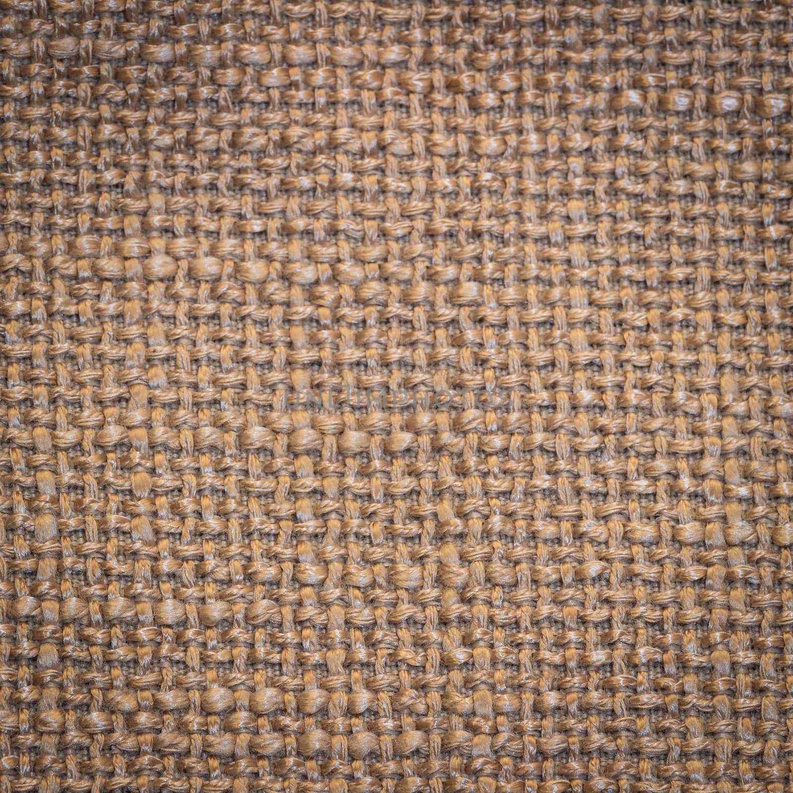 Rustic canvas fabric texture in beige color. Square shape