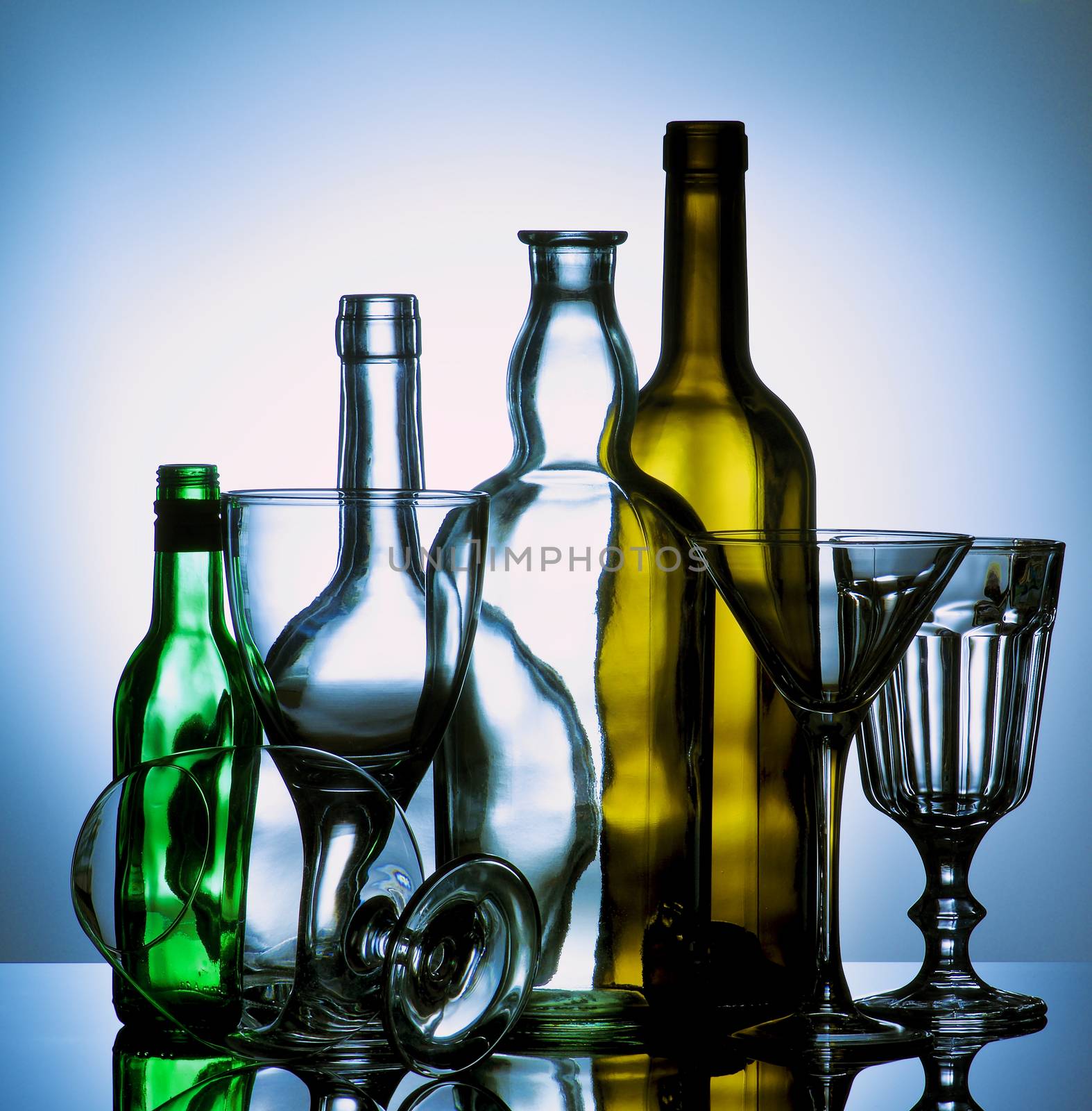 Empty Wine Glasses and Bottles by zhekos