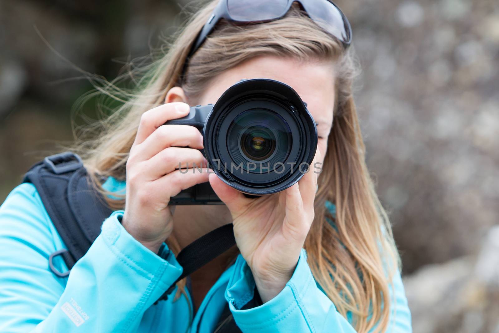 Close up of a female photographer by michaklootwijk