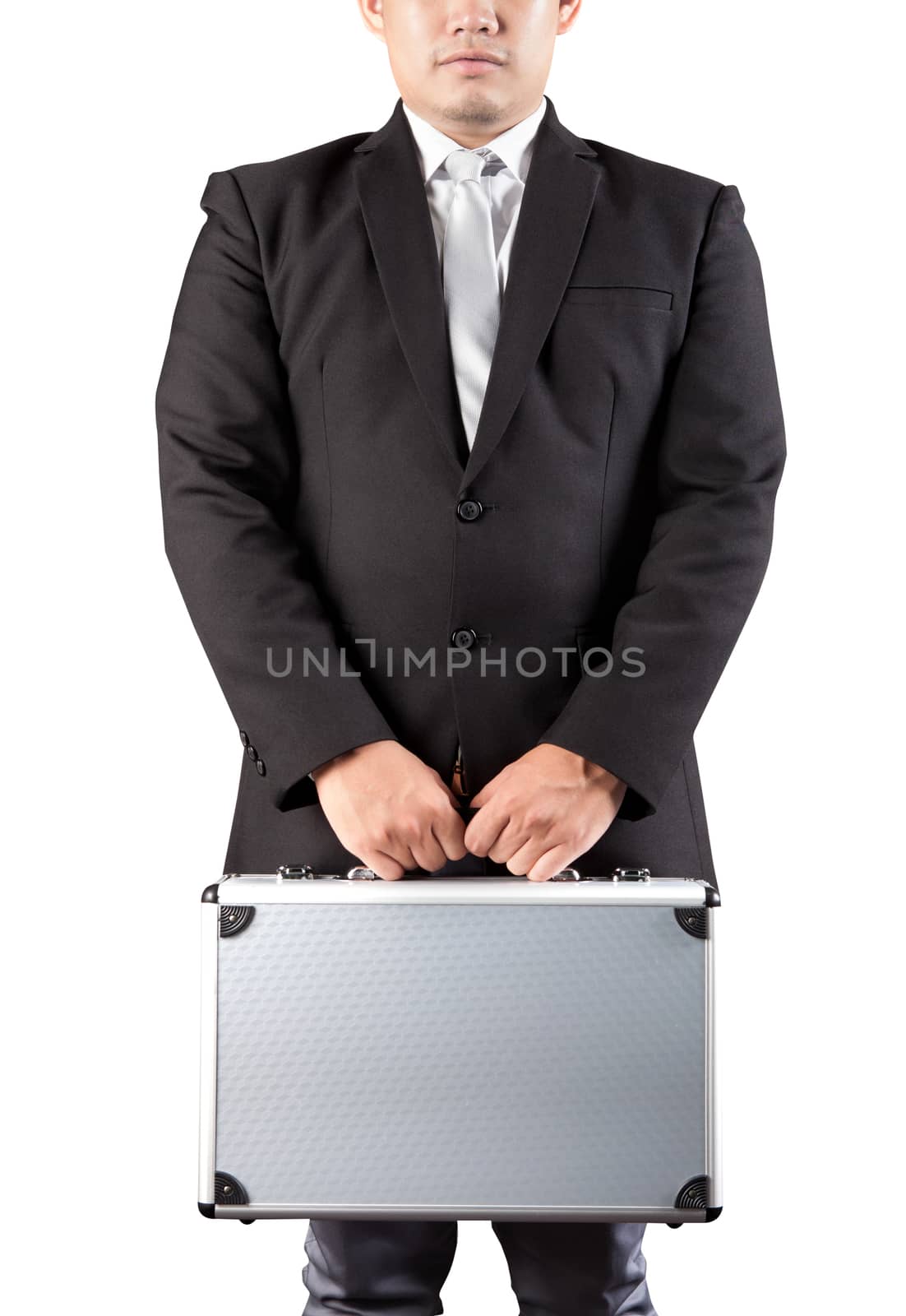 young business man holding strong metal briefcase in hand isolat by khunaspix