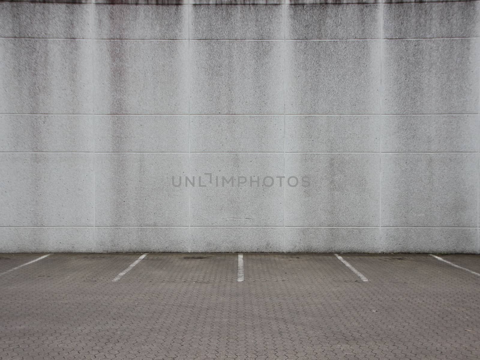 Empty Grey Urban Ghetto Parking Lot with Wall by HoleInTheBox