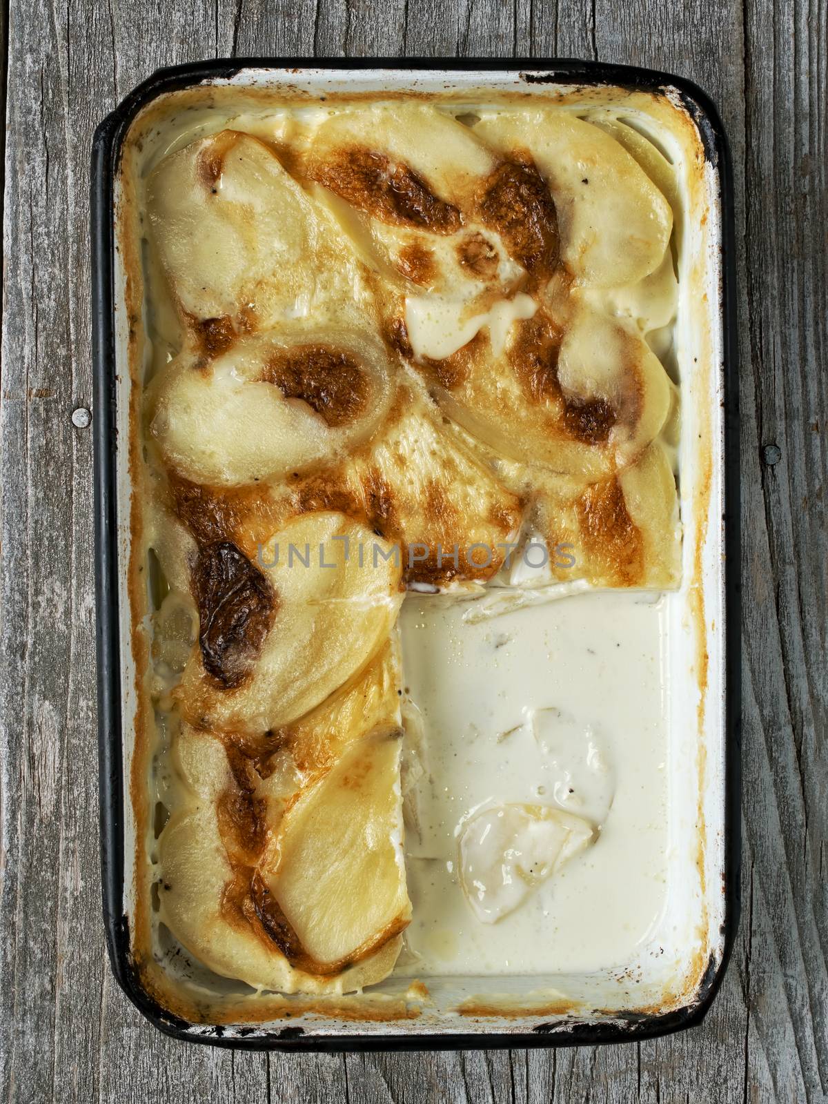 rustic golden scalloped potato gratin dauphinois by zkruger