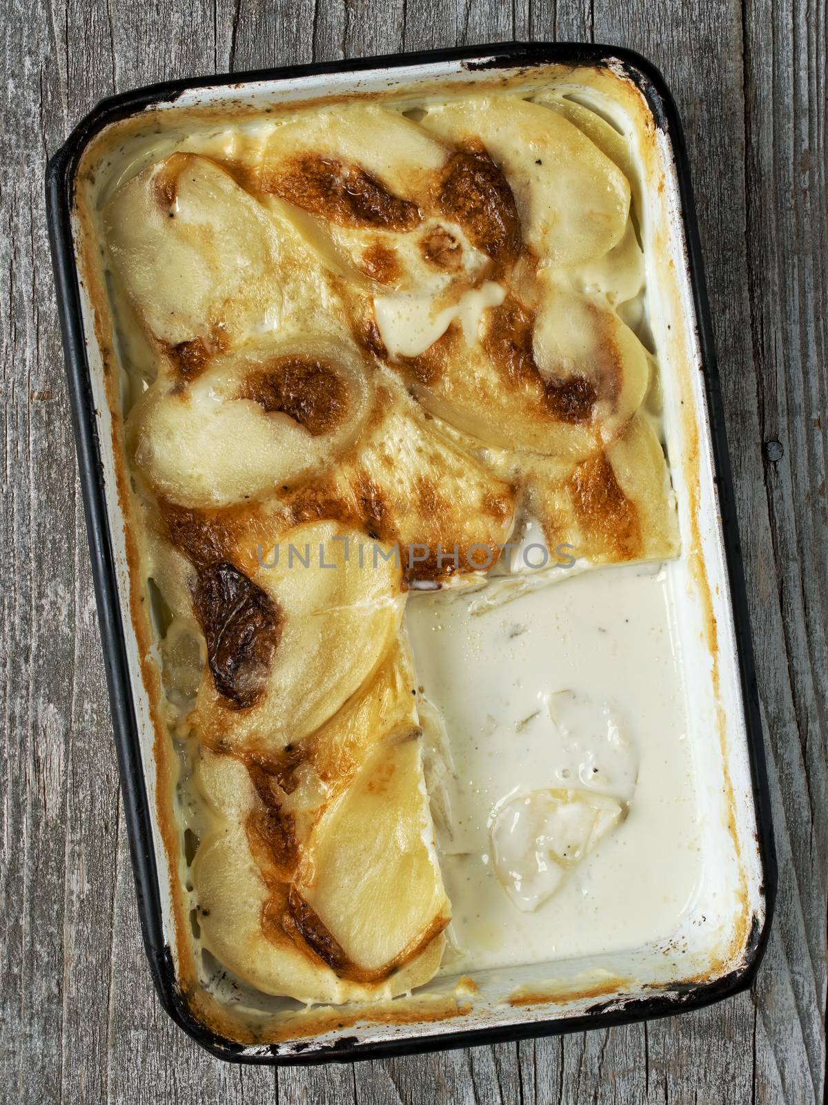 rustic golden scalloped potato gratin dauphinois by zkruger