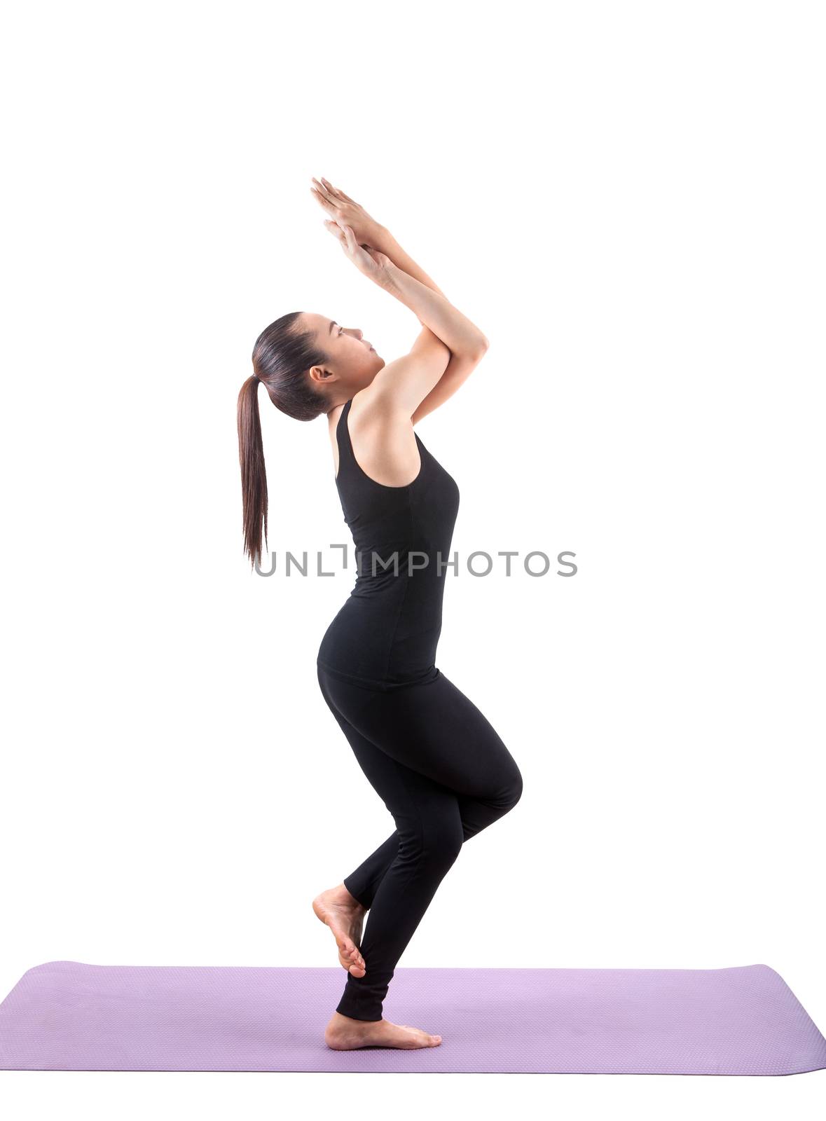 portrait of asian woman wearing black body suit sitting in yoga meditation position isolated white background