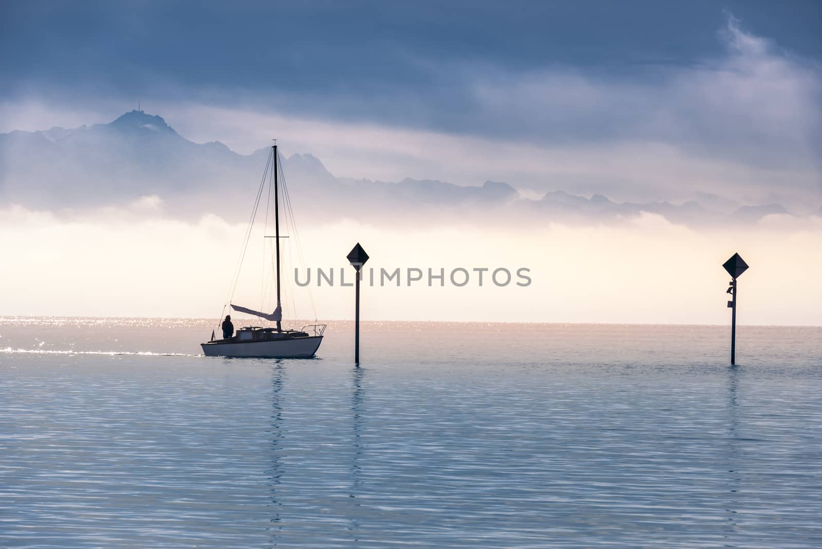 Boat sailing on a lake  by YesPhotographers