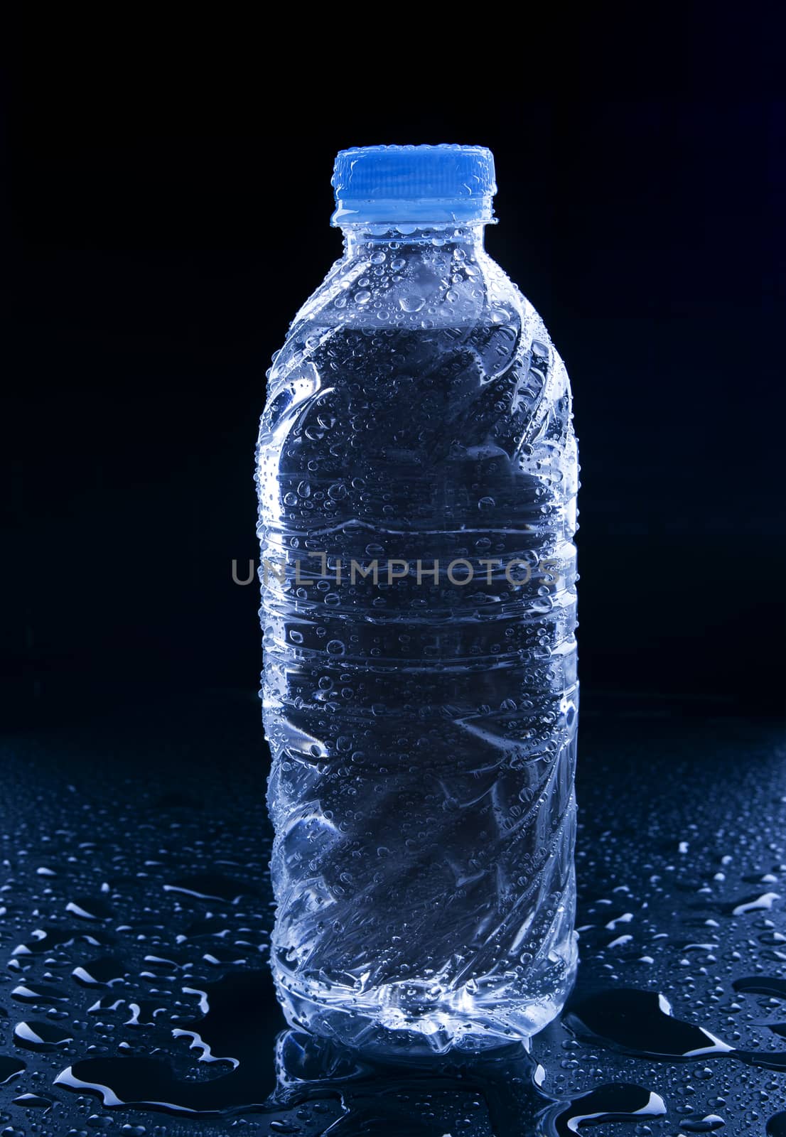 water bottle on black with refreshment dew use for beverage and clean drinking water topic