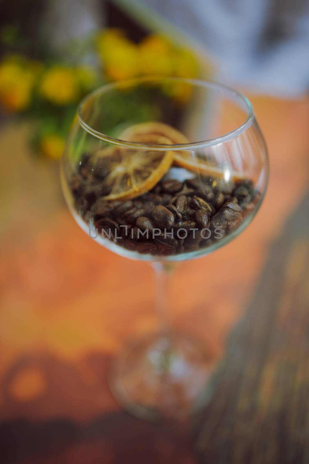 coffee beans in glass , shallow depth of field