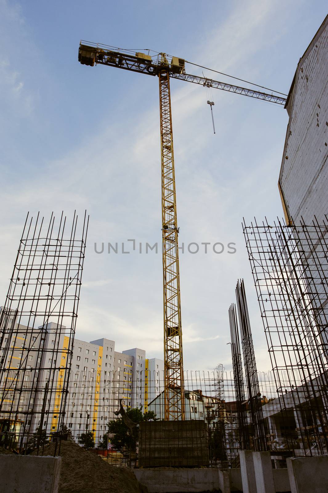 Construction site with crane and building, View from bottom