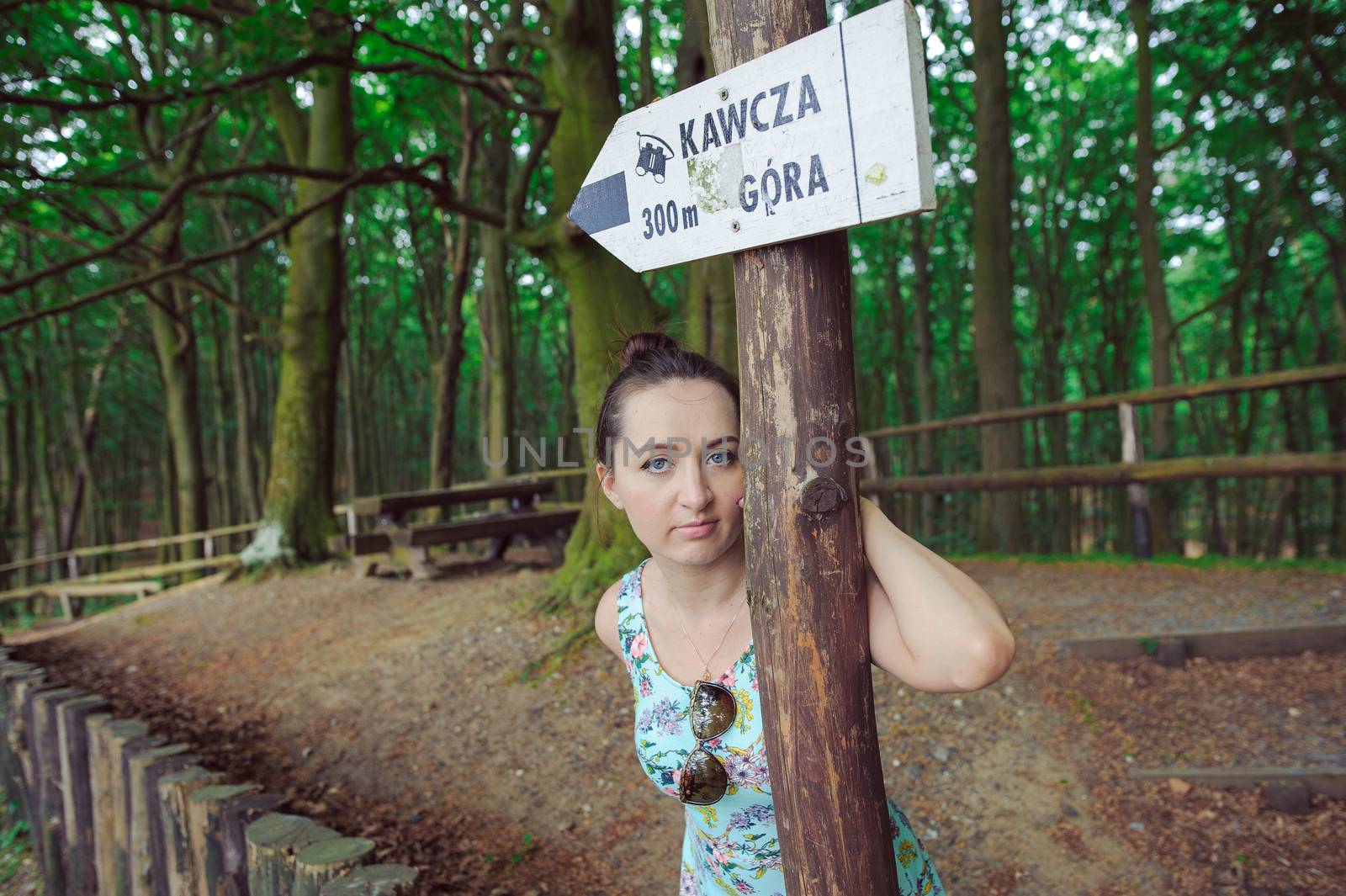 Young girl on a walk in the forest.