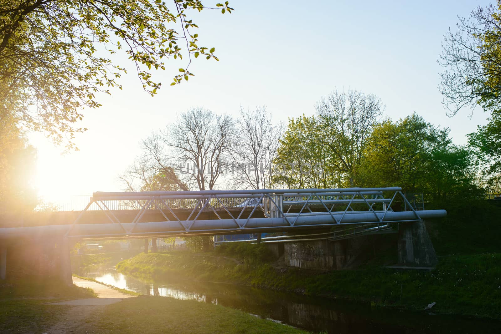Small bridge in the city in spring