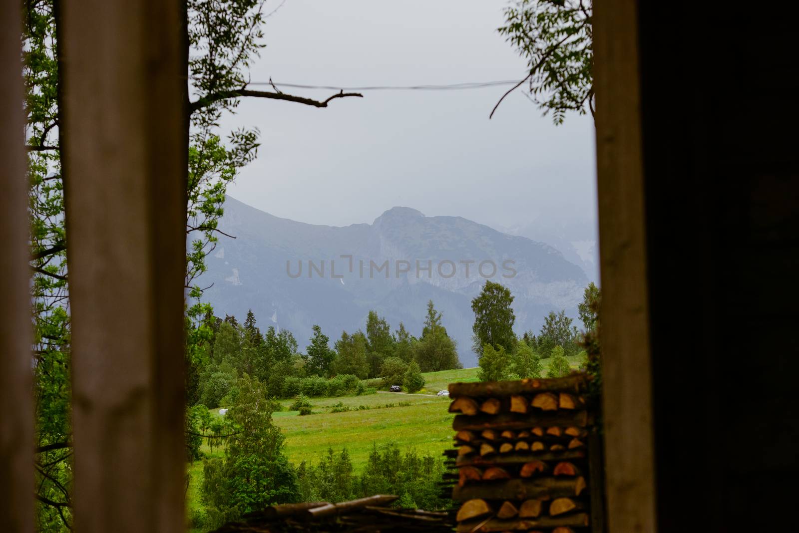 Summer mountain landscape with traditional huts in Tatra mountain.