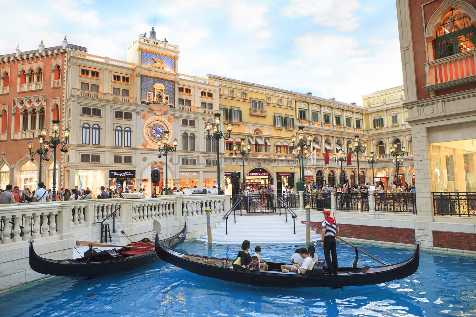 COTAI STRIP, MACAU, CHINA-AUGUST 22 visitor on gondola boat in Venetian Hotel  The famous shopping mall, luxury hotel important landmark and the largest casino in the world on august 22,2014 in Macau China 