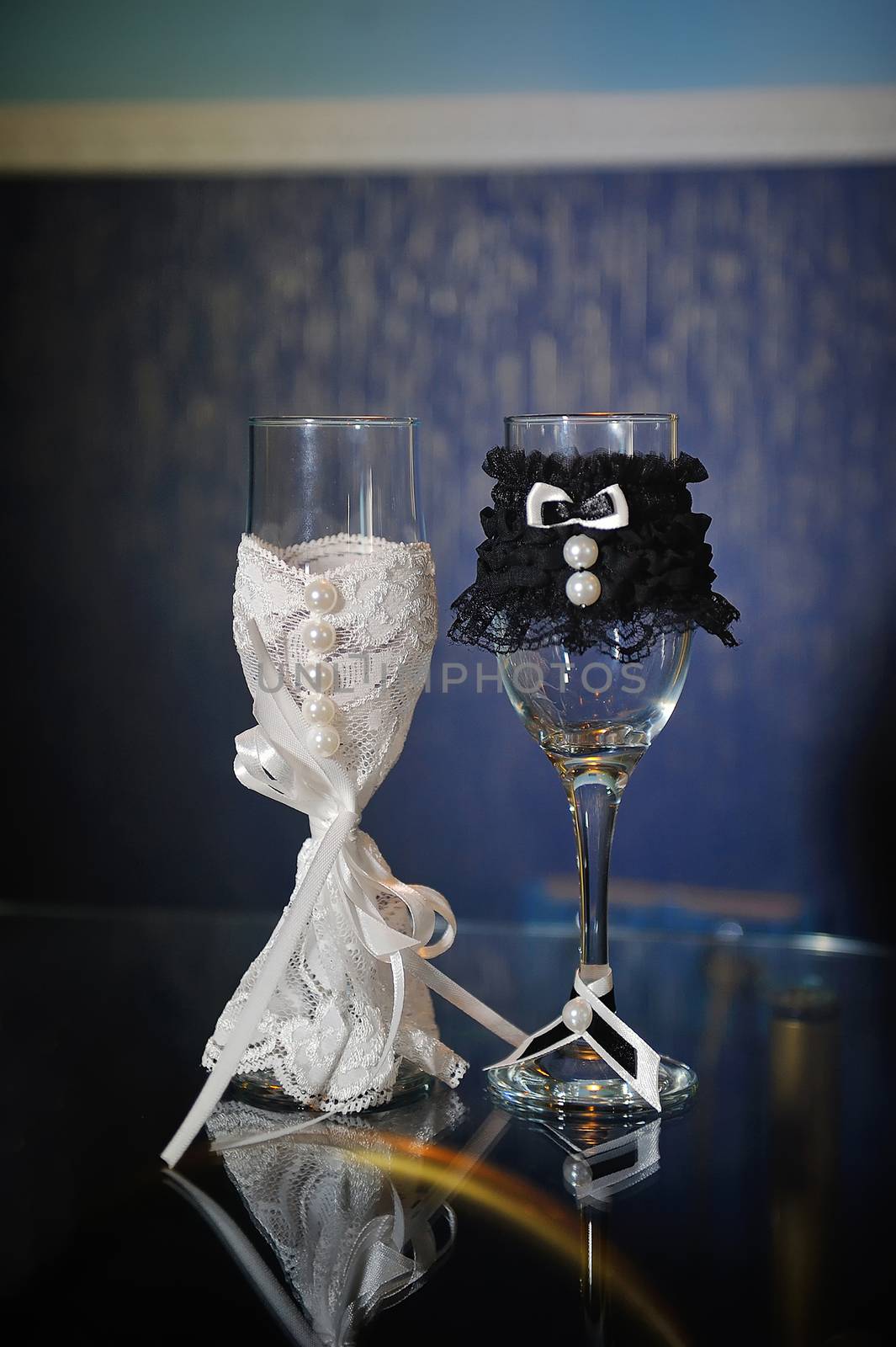 Decorated wedding glasses bride and groom