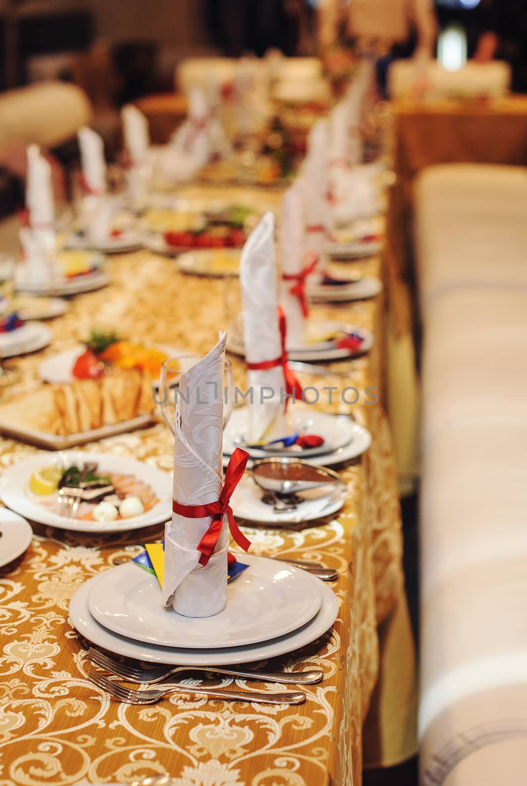 Table setting with red ribbon