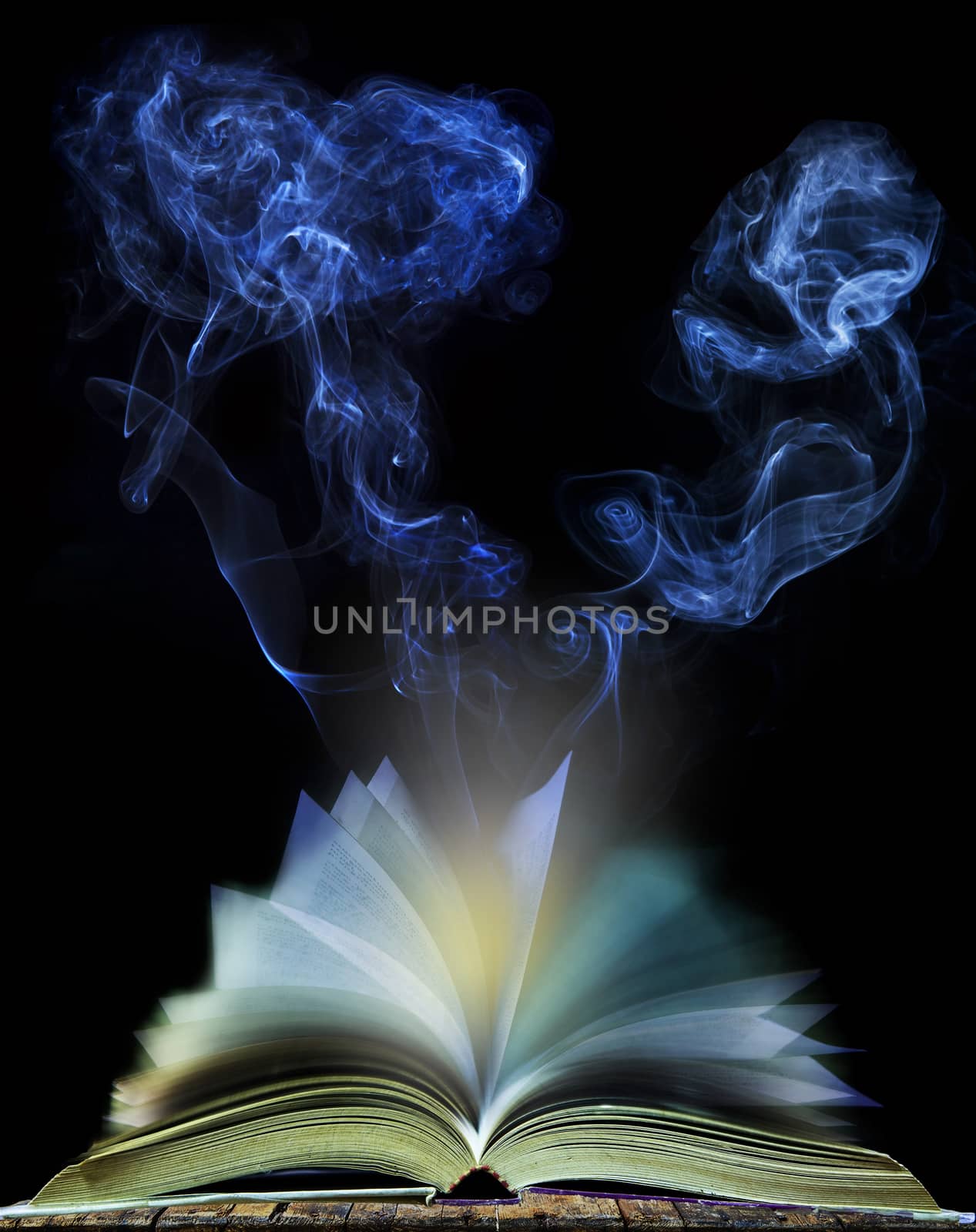 abstract of  open book page with moving smoke on black background use for education and idea creative object