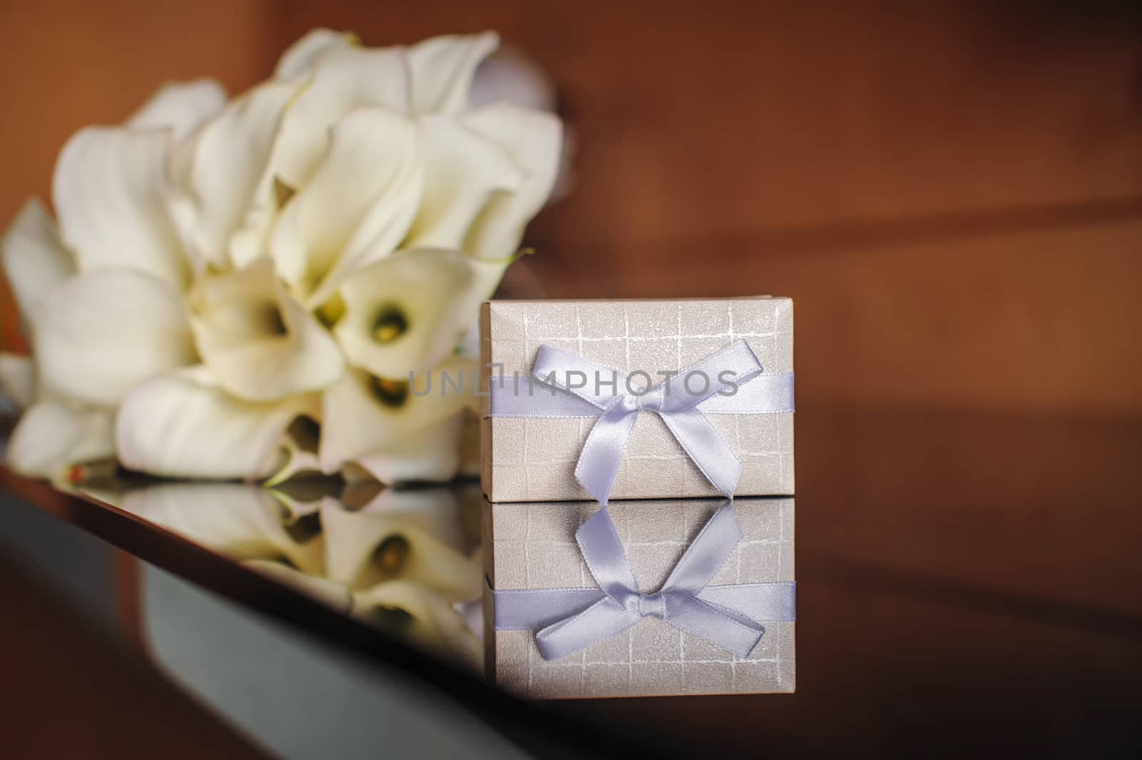 Little gift box background bouquet of flowers