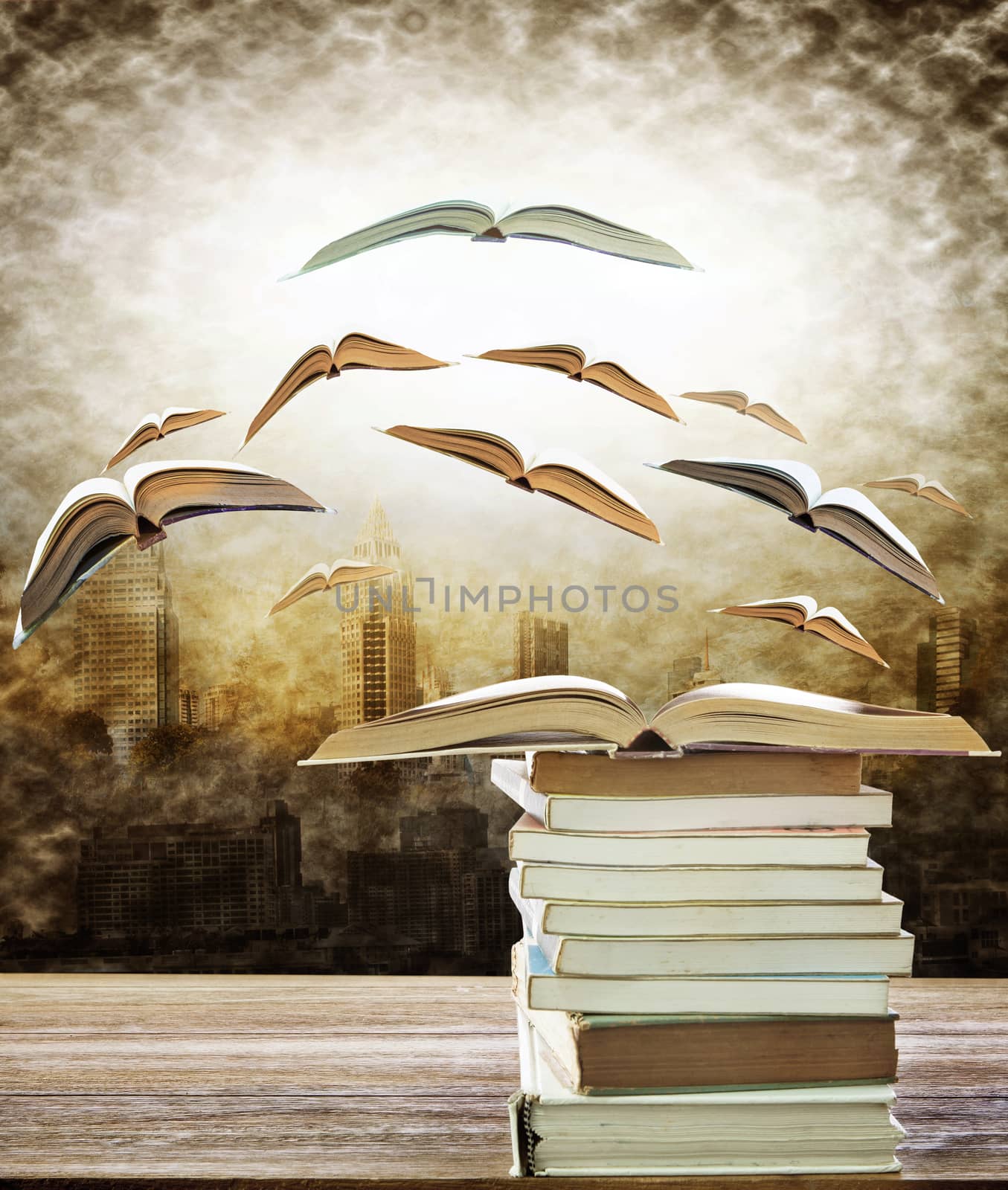abstract of open book on stack and flying book to the light over urban scene use for idea ,creative and education topic
