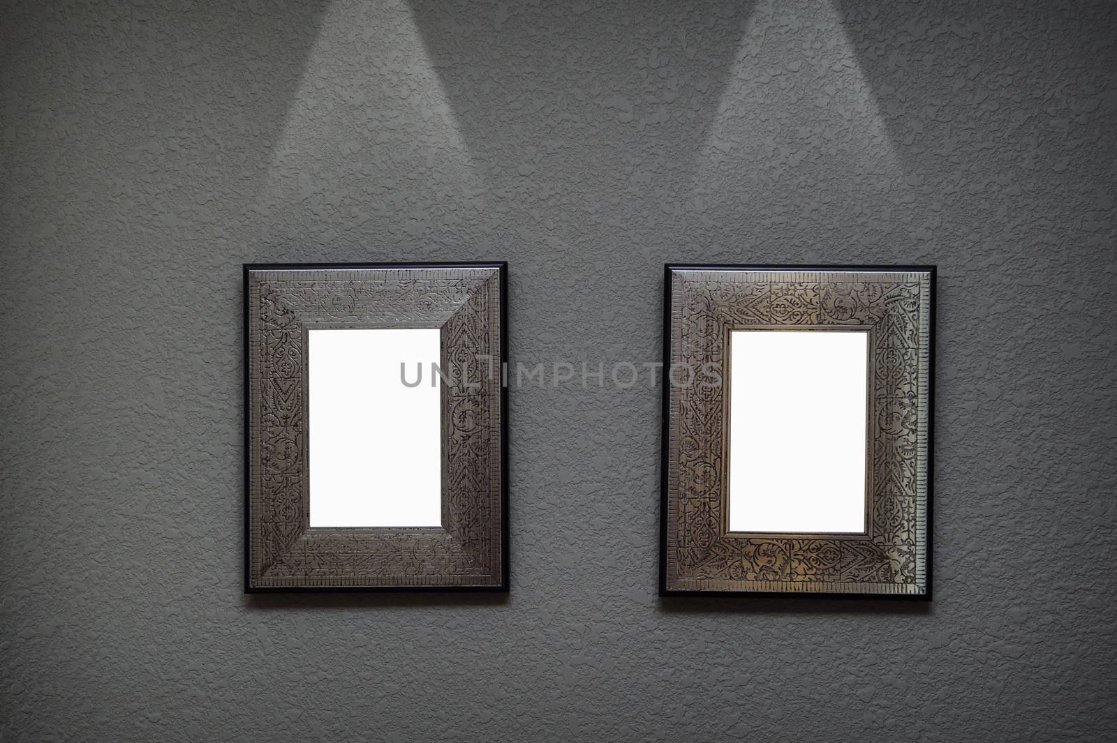 two metal frame on the wall with lighting